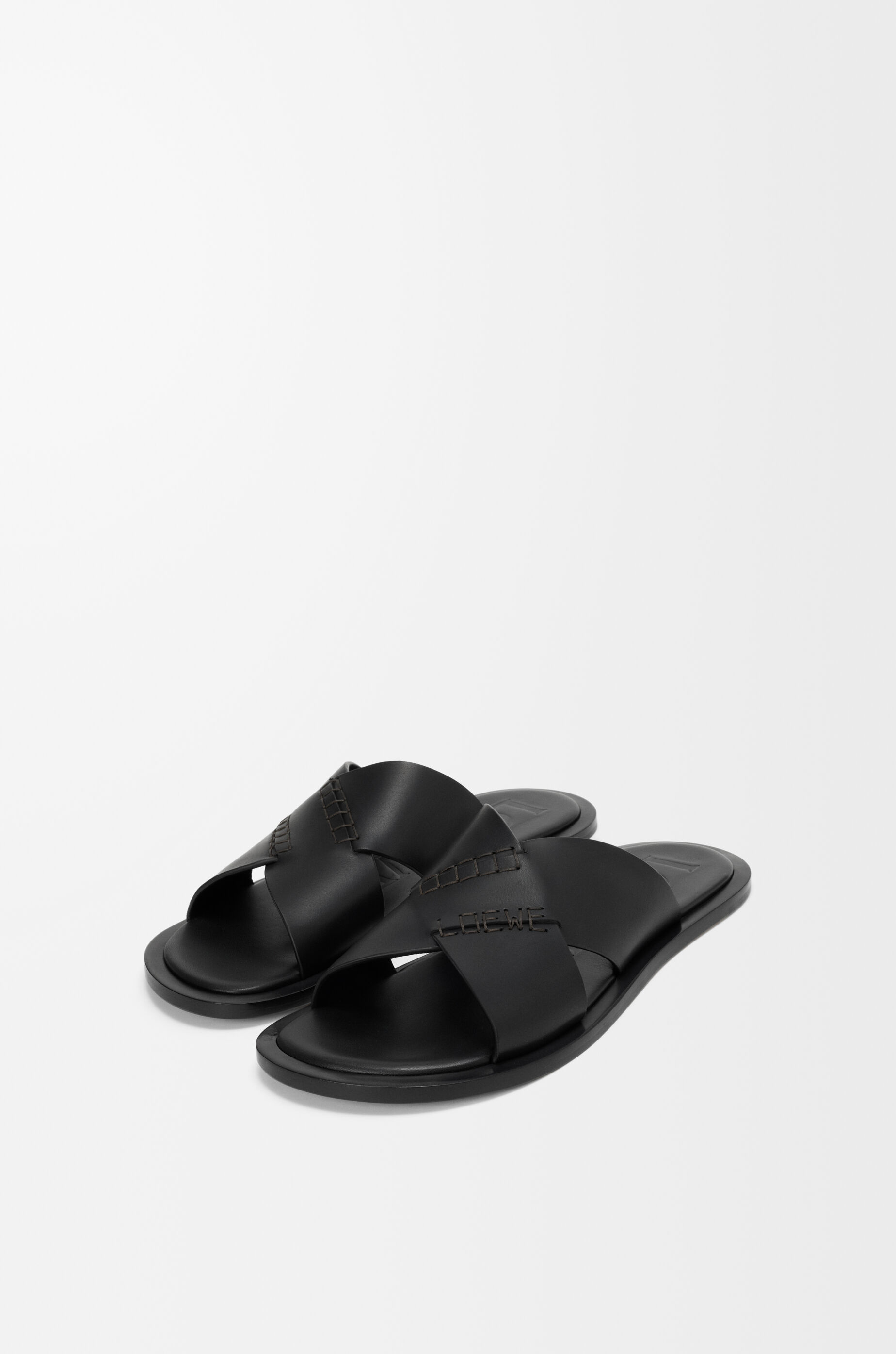 LOEWE Flex criss-cross slide in vegetable-tanned calfskin Black