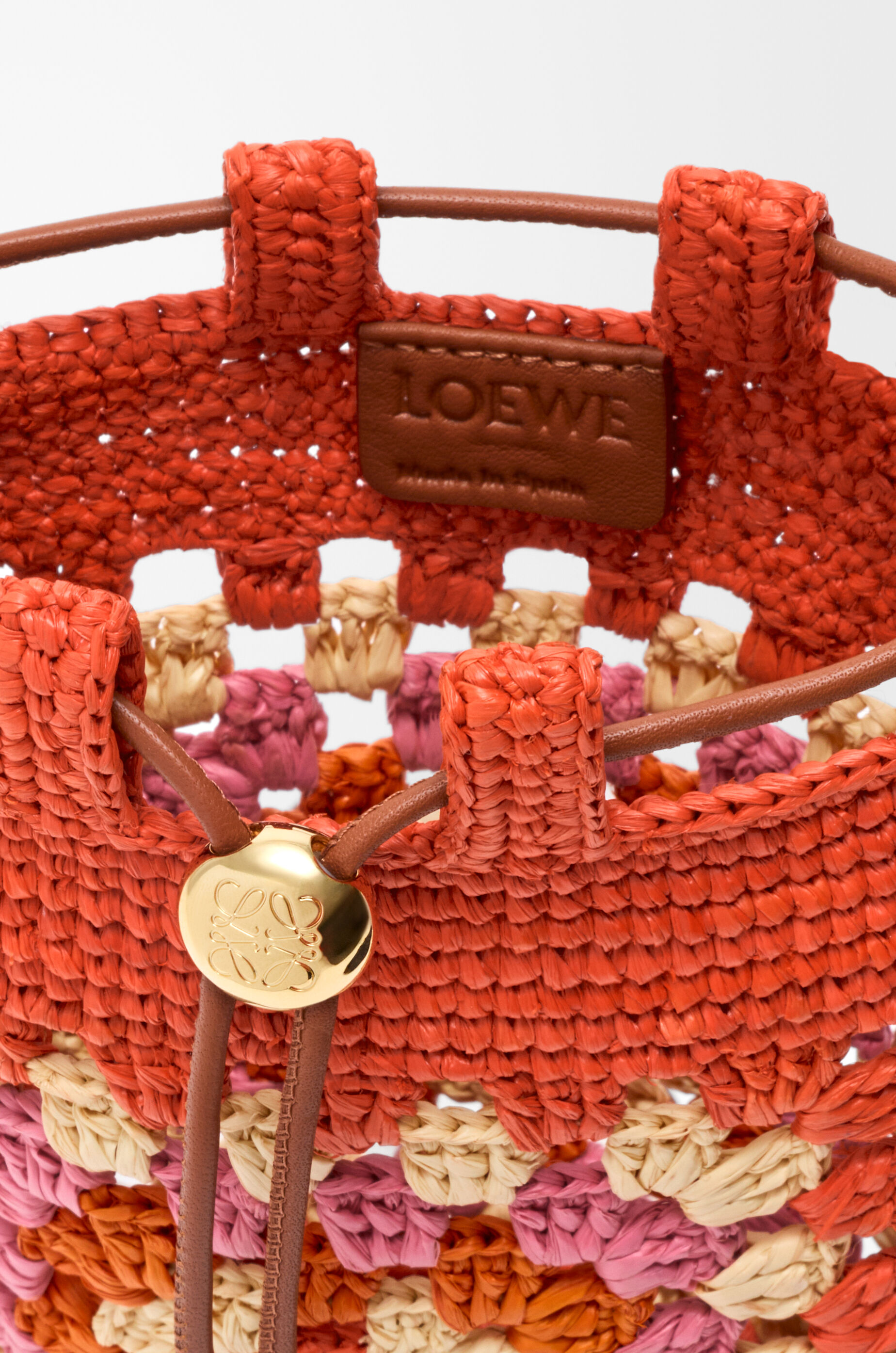 LOEWE Drawstring pocket in classic calfskin and raffia Bright Orange/Pink