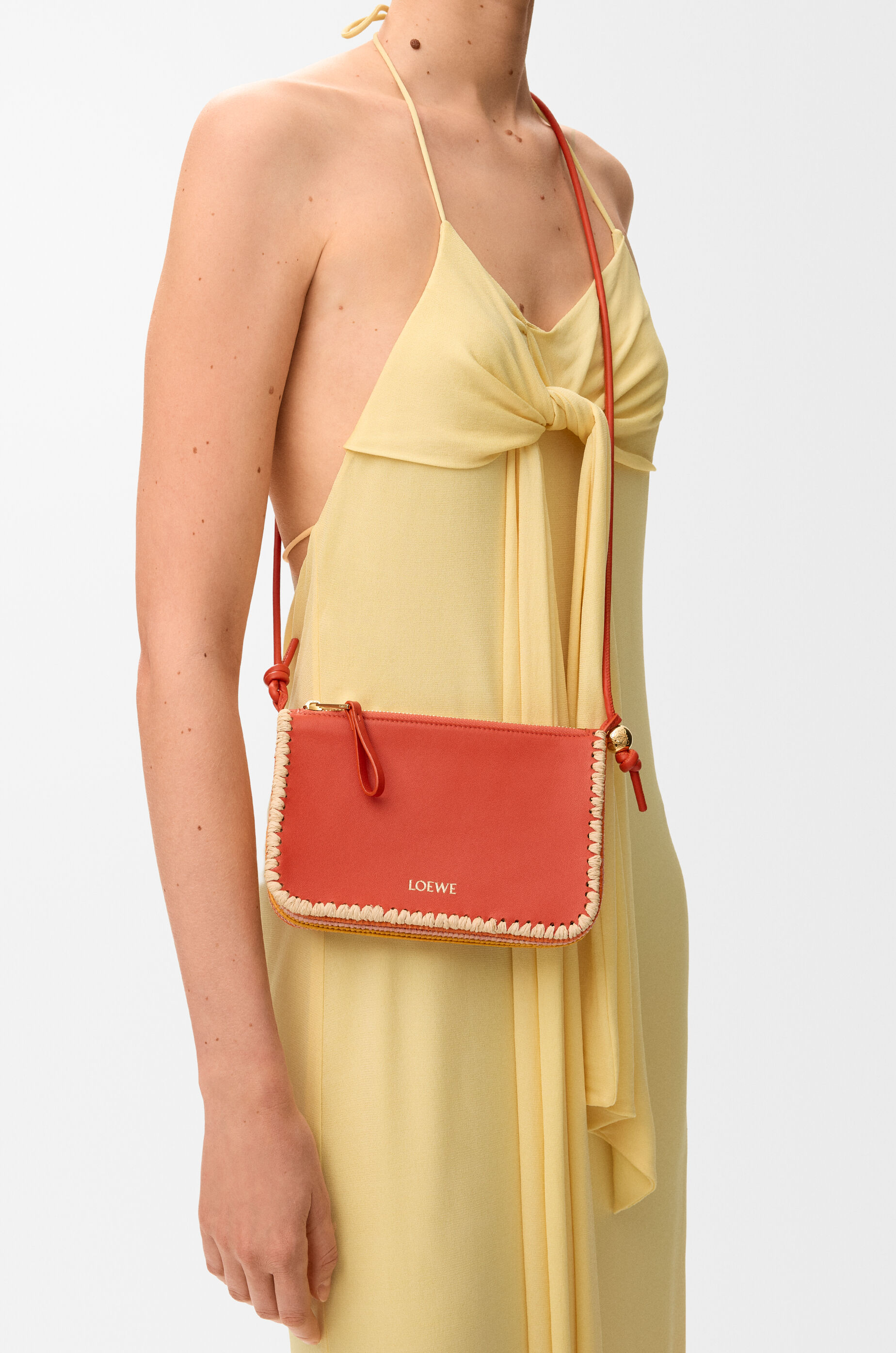LOEWE Rio pouch in classic calfskin and raffia Deep Saffron