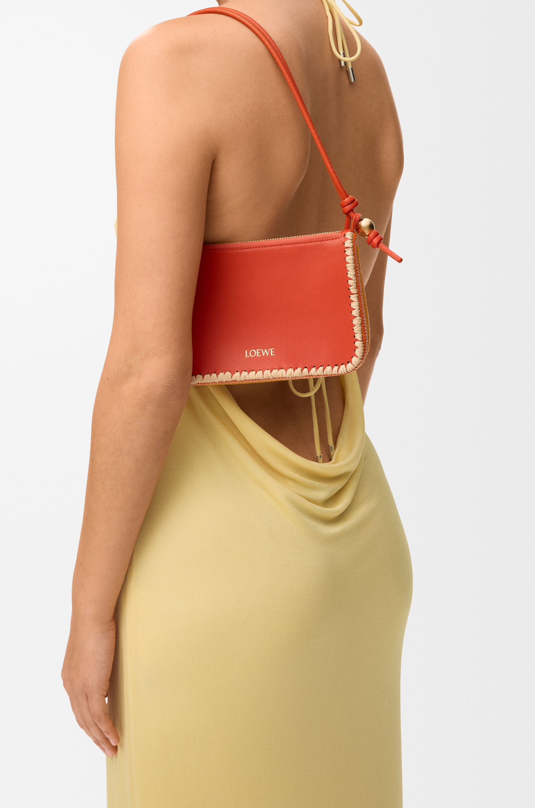 LOEWE Rio pouch in classic calfskin and raffia Deep Saffron
