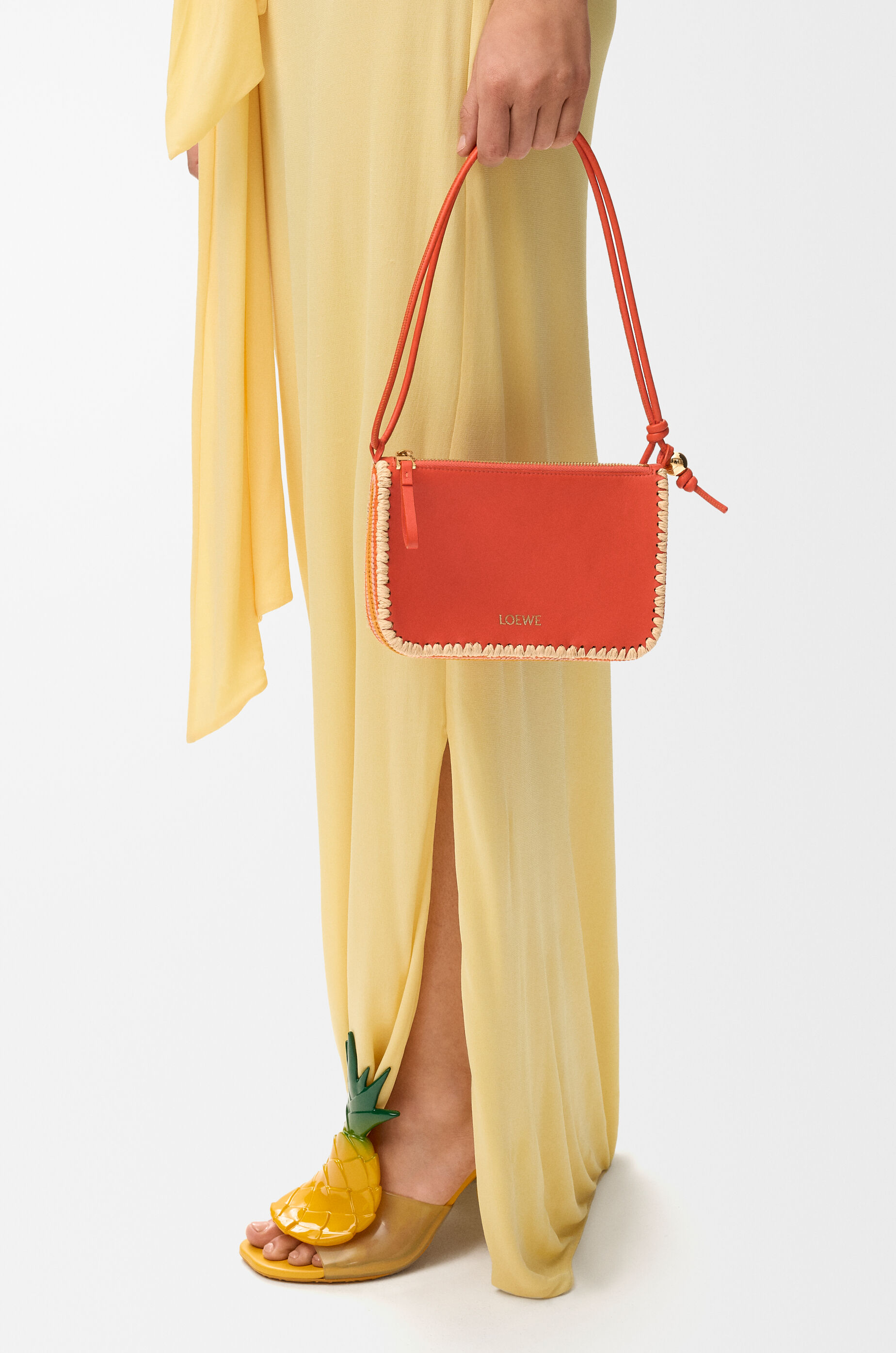 LOEWE Rio pouch in classic calfskin and raffia Deep Saffron