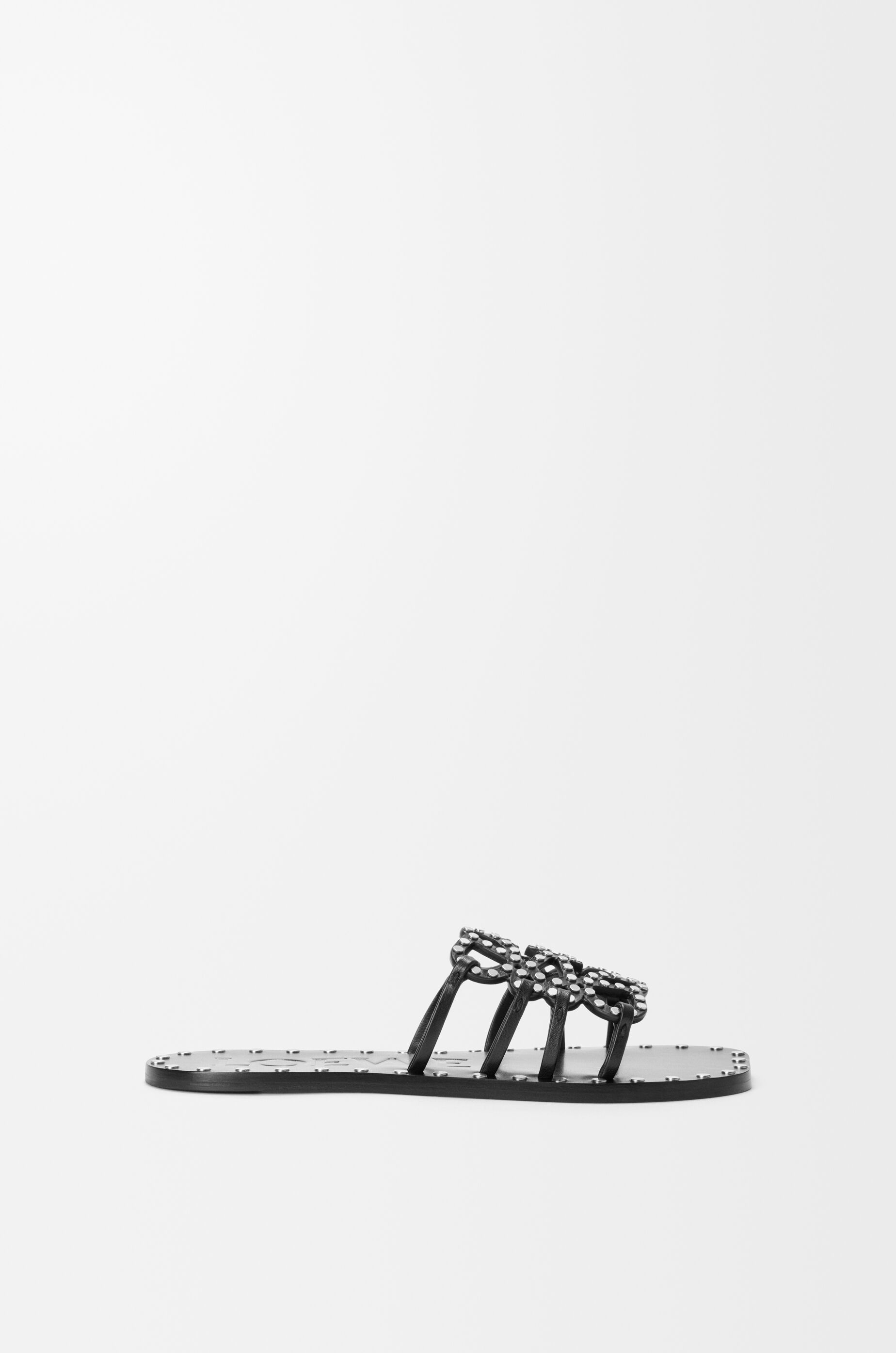 LOEWE Petal Anagram slide in vegetable-tanned calfskin and metallic studs Black